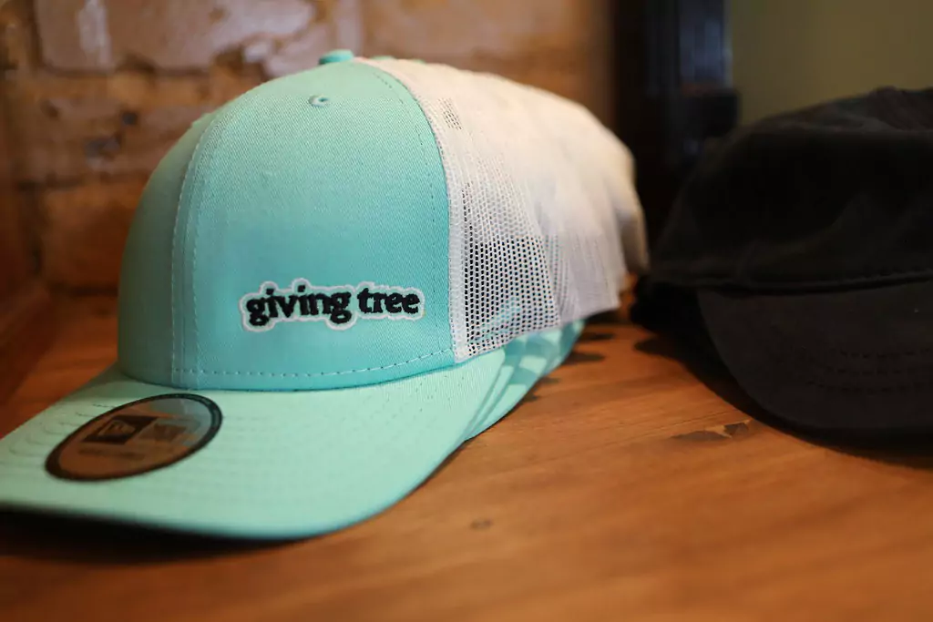 giving-tree-dc-i-71-compliant-weed-dispensary-merch-caps